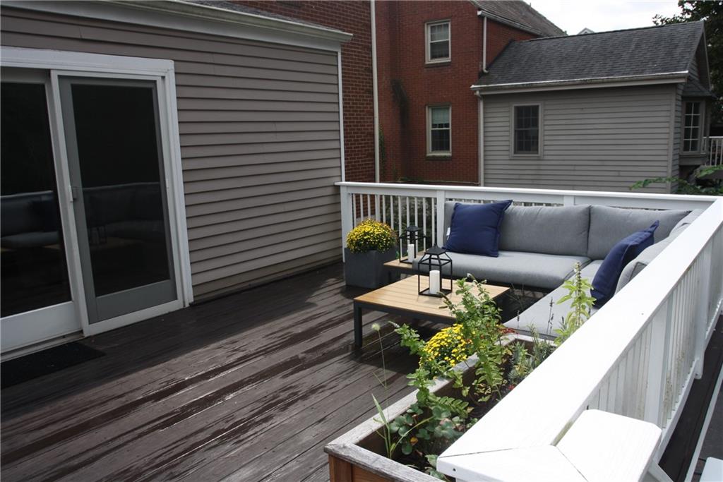 138 Mohawk Drive Pittsburgh, PA 15228 - Photo 20 of 24 a balcony with furniture and wooden floor