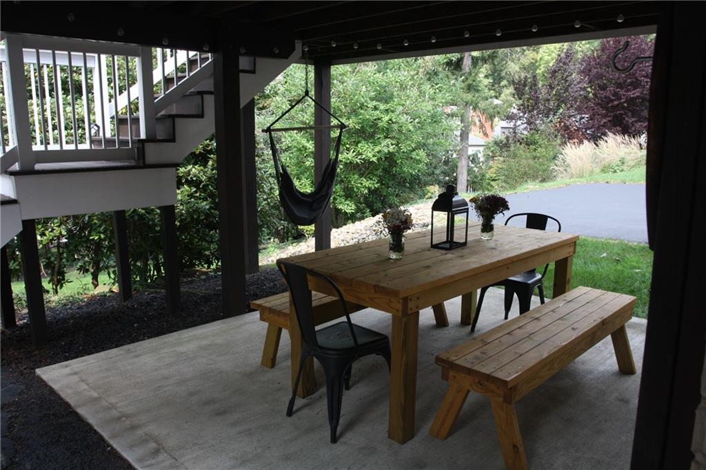138 Mohawk Drive Pittsburgh, PA 15228 - Photo 23 of 24 a view of a dining table and chairs in the patio