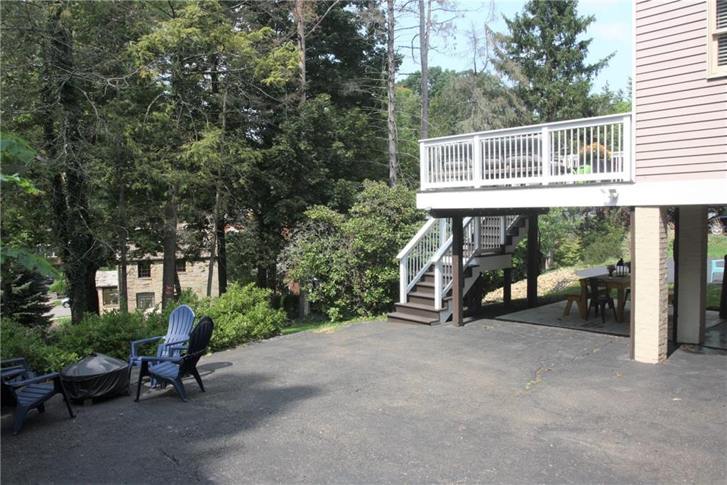 138 Mohawk Drive Pittsburgh, PA 15228 - Photo 24 of 24 a view of backyard with wheel chair and potted plants