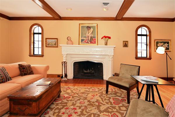 65 Sumner Road Brookline, MA 02445 - Photo 8 of 10 a living room with furniture and a fireplace