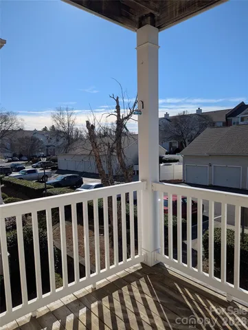 a view of a wooden fence