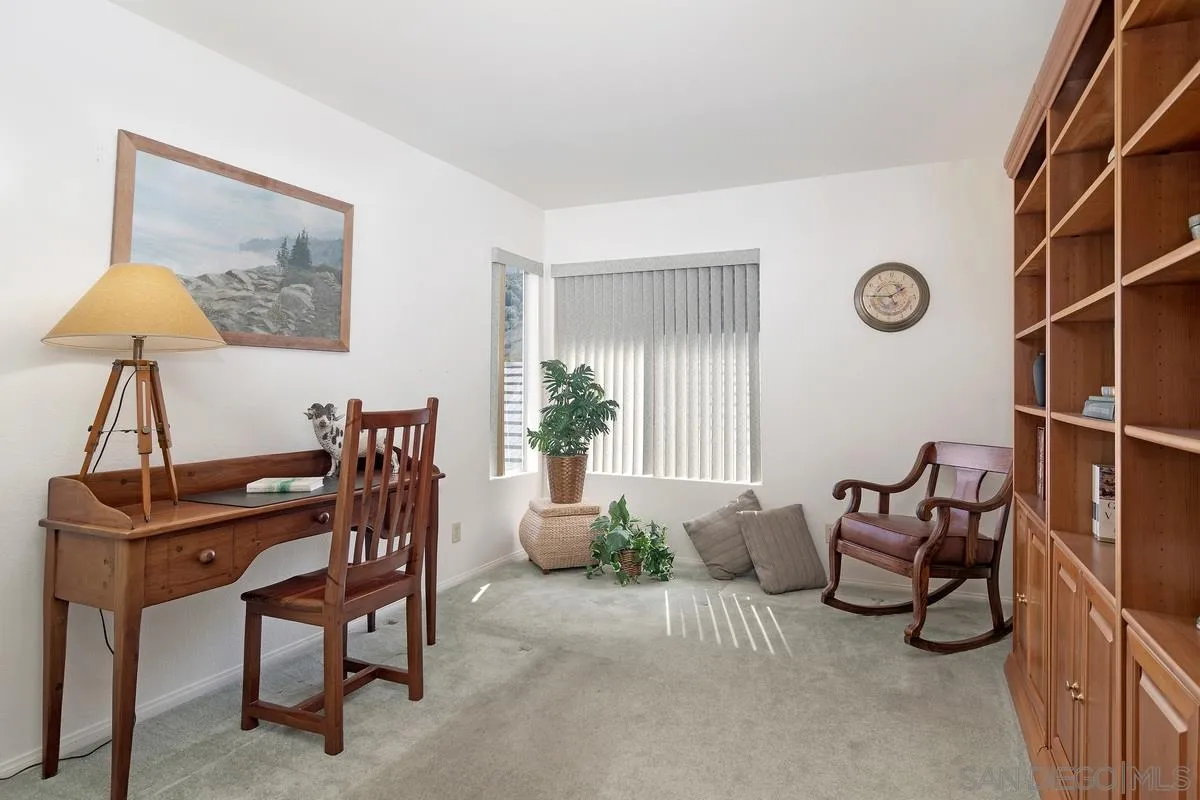 1237 Buttonwood Court El Cajon, CA 92019 - Photo 22 of 45 a view of a workspace with furniture and a window