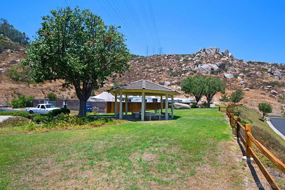 1237 Buttonwood Court El Cajon, CA 92019 - Photo 41 of 45 a view of a house with a big yard plants and large trees