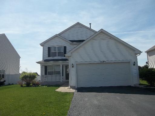 6508 Roth Drive Joliet, IL 60431 - Photo 1 of 14 a front view of a house with garden