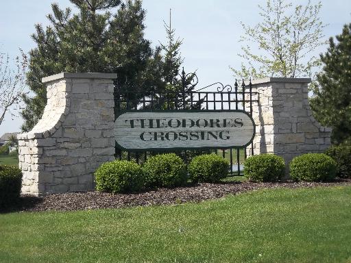 6508 Roth Drive Joliet, IL 60431 - Photo 2 of 14 a sign on the side of a building