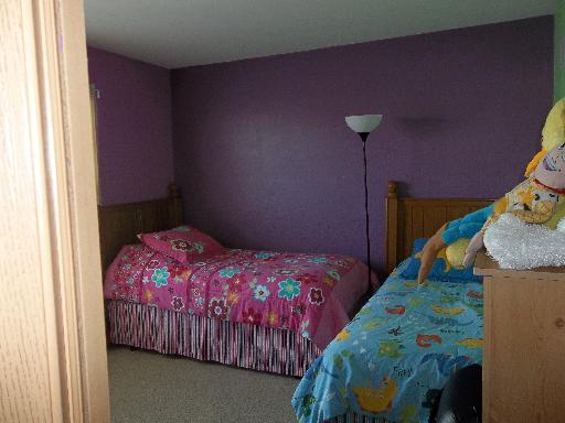 6508 Roth Drive Joliet, IL 60431 - Photo 14 of 14 a bedroom with two beds next to a window