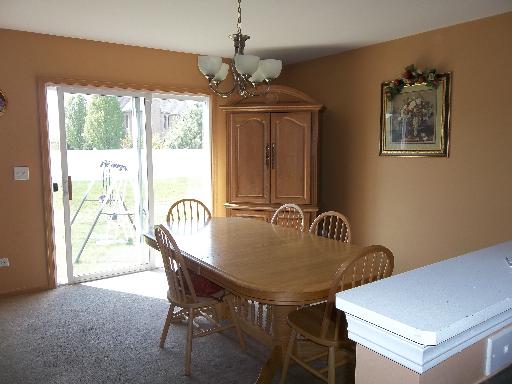6508 Roth Drive Joliet, IL 60431 - Photo 5 of 14 a dining room with furniture and window