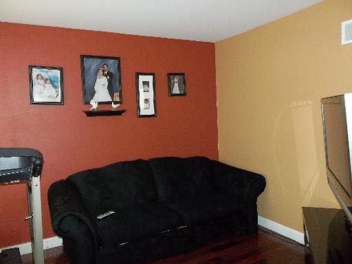 6508 Roth Drive Joliet, IL 60431 - Photo 9 of 14 a view of a workspace with furniture and wooden floor