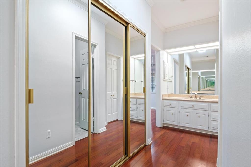 3410 Timbermill Road Waco, TX 76710 - Photo 18 of 32 a bathroom with a glass shower door and a mirror