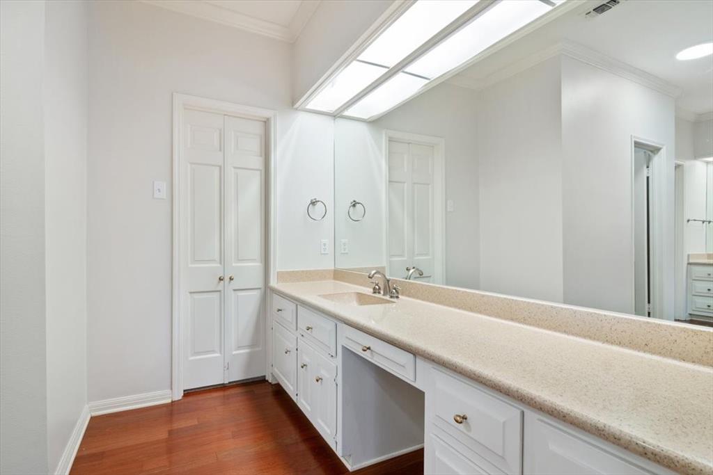 3410 Timbermill Road Waco, TX 76710 - Photo 20 of 32 a bathroom with a sink and a mirror