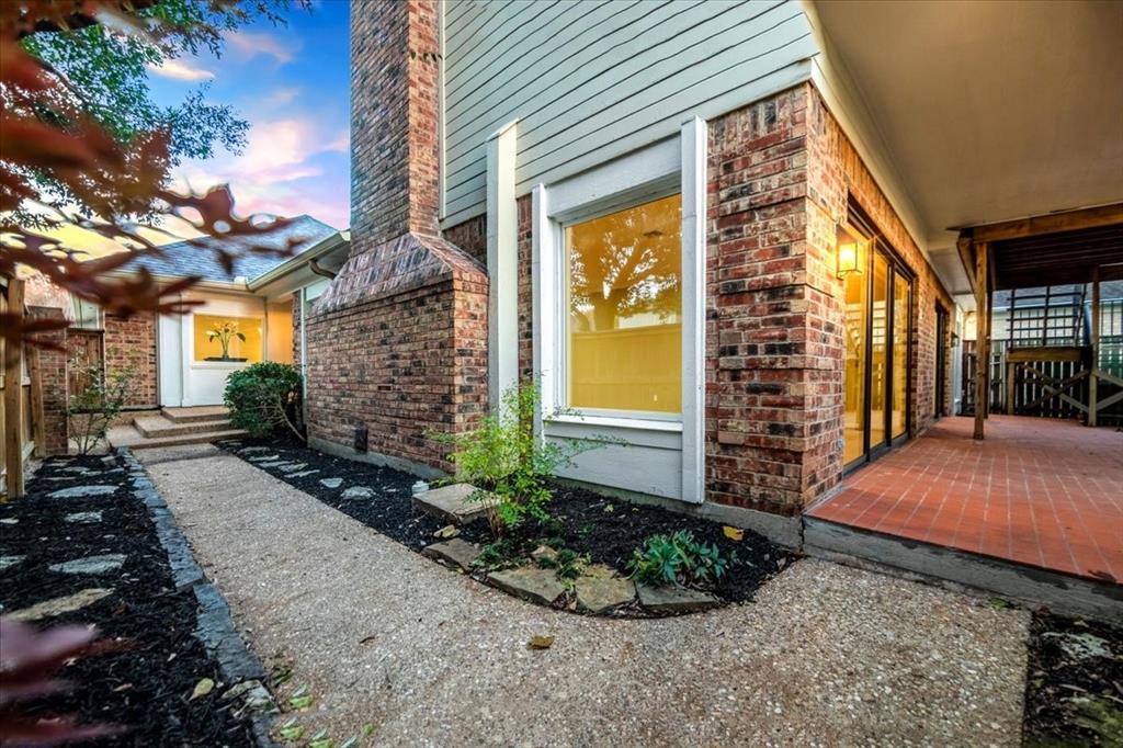 3410 Timbermill Road Waco, TX 76710 - Photo 28 of 32 a view of a house with brick walls and a small yard