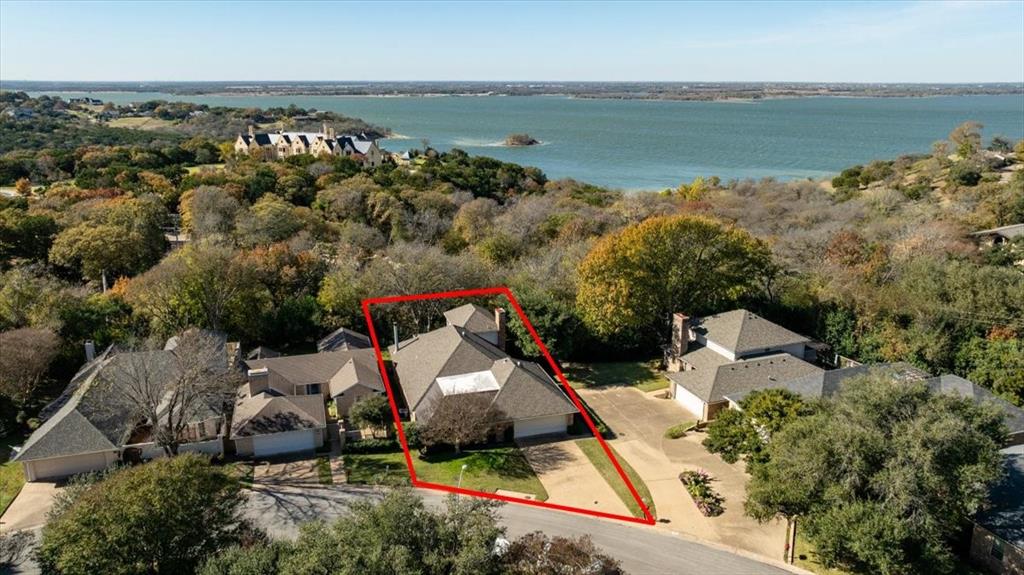 3410 Timbermill Road Waco, TX 76710 - Photo 29 of 32 an aerial view of a house with a garden and lake view