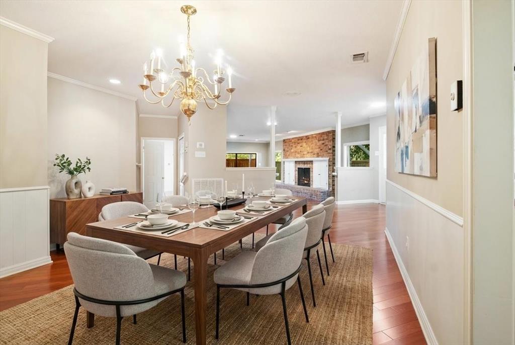 3410 Timbermill Road Waco, TX 76710 - Photo 7 of 32 a view of a dining room with furniture and wooden floor