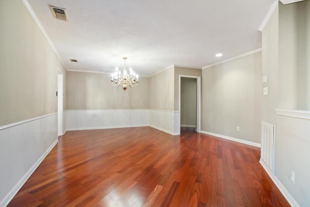 3410 Timbermill Road Waco, TX 76710 - Photo 8 of 32 wooden floor in an empty room with a window