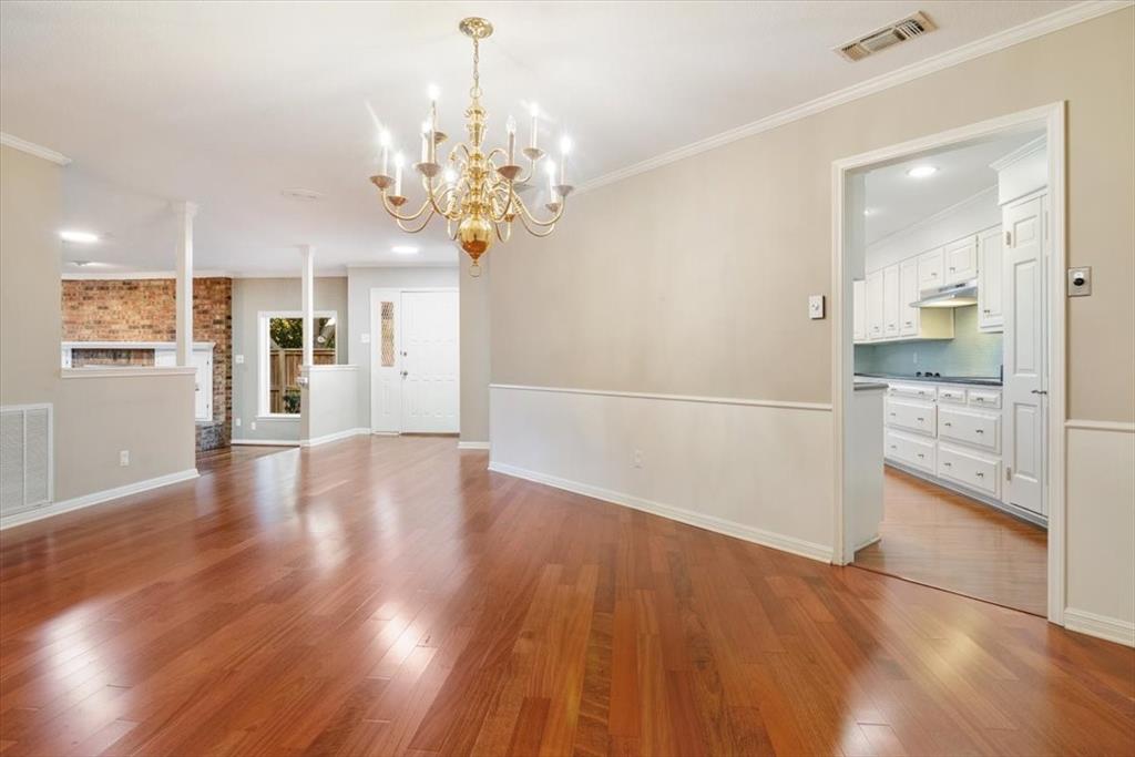 3410 Timbermill Road Waco, TX 76710 - Photo 9 of 32 a view of a kitchen with wooden floor and a kitchen
