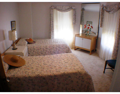 27 Standish Road Watertown, MA 02472 - Photo 3 of 10 a bedroom with a bed and a cabinets
