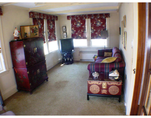 27 Standish Road Watertown, MA 02472 - Photo 7 of 10 a living room with furniture and a window