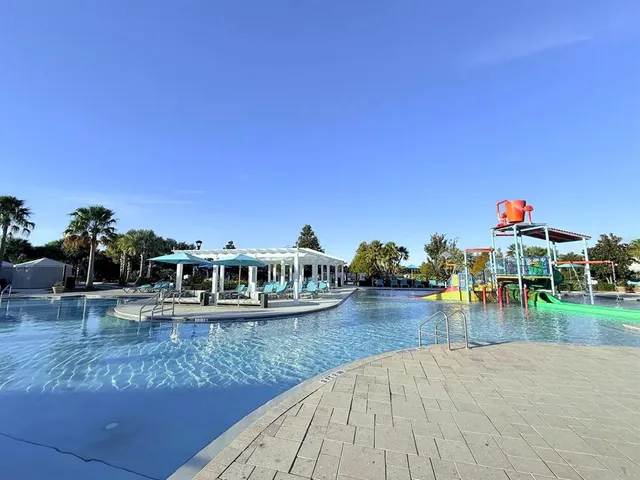 a view of a house with swimming pool