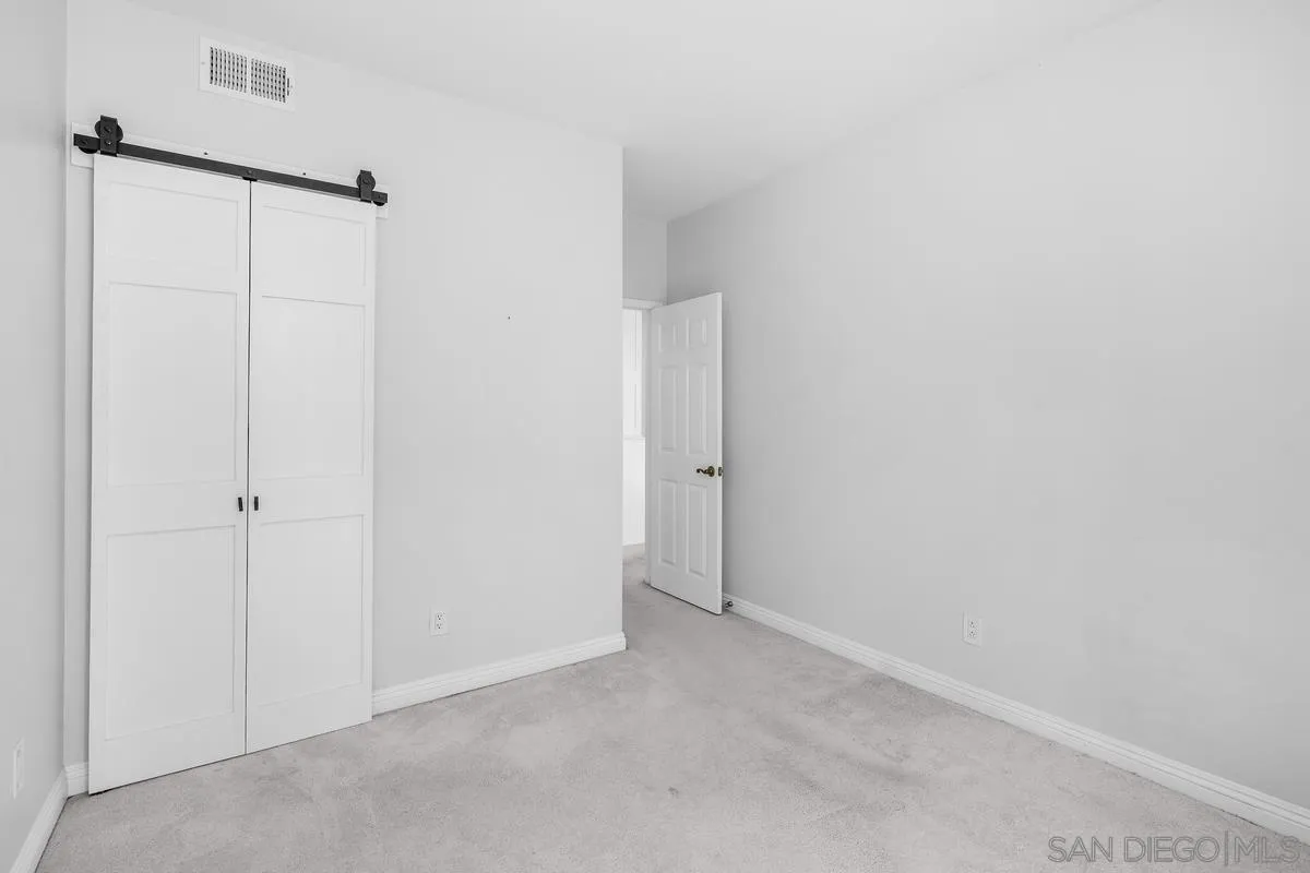 5845 Friars Road, Unit 1201 San Diego, CA 92110 - Photo 17 of 24 a view of an empty room
