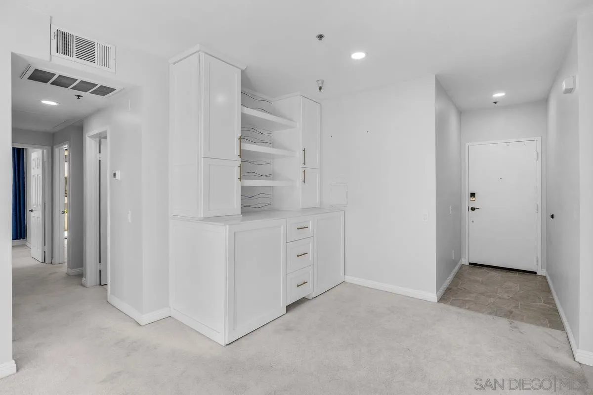 5845 Friars Road, Unit 1201 San Diego, CA 92110 - Photo 18 of 24 a view of an empty room with closet and a bathroom