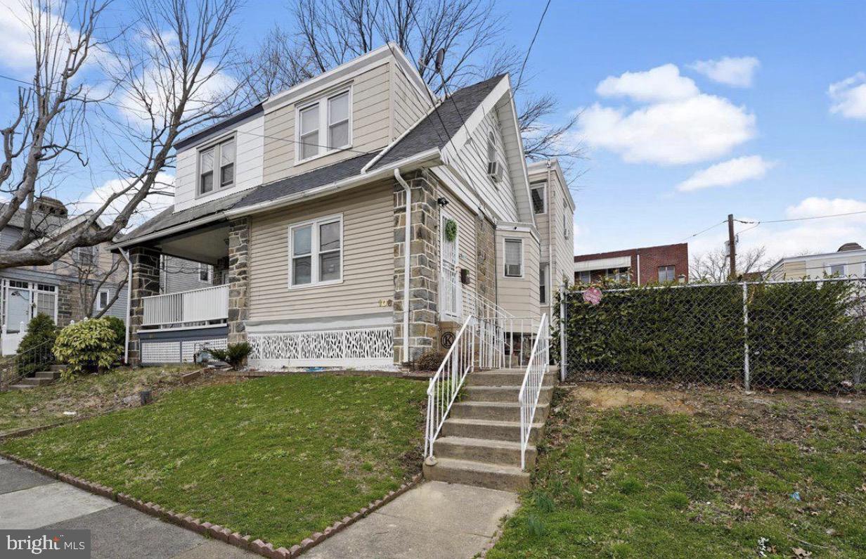106 Ashby Road Upper Darby, PA 19082 - Photo 1 of 1 a front view of a house with a yard