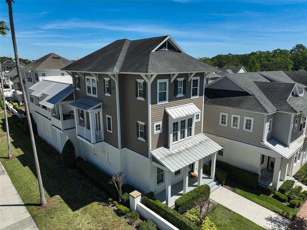 1616 Resolute Street Celebration, FL 34747 - Photo 2 of 46 a front view of a house with a yard