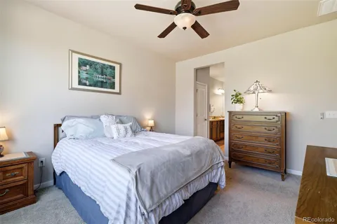 a bedroom with a bed and furniture