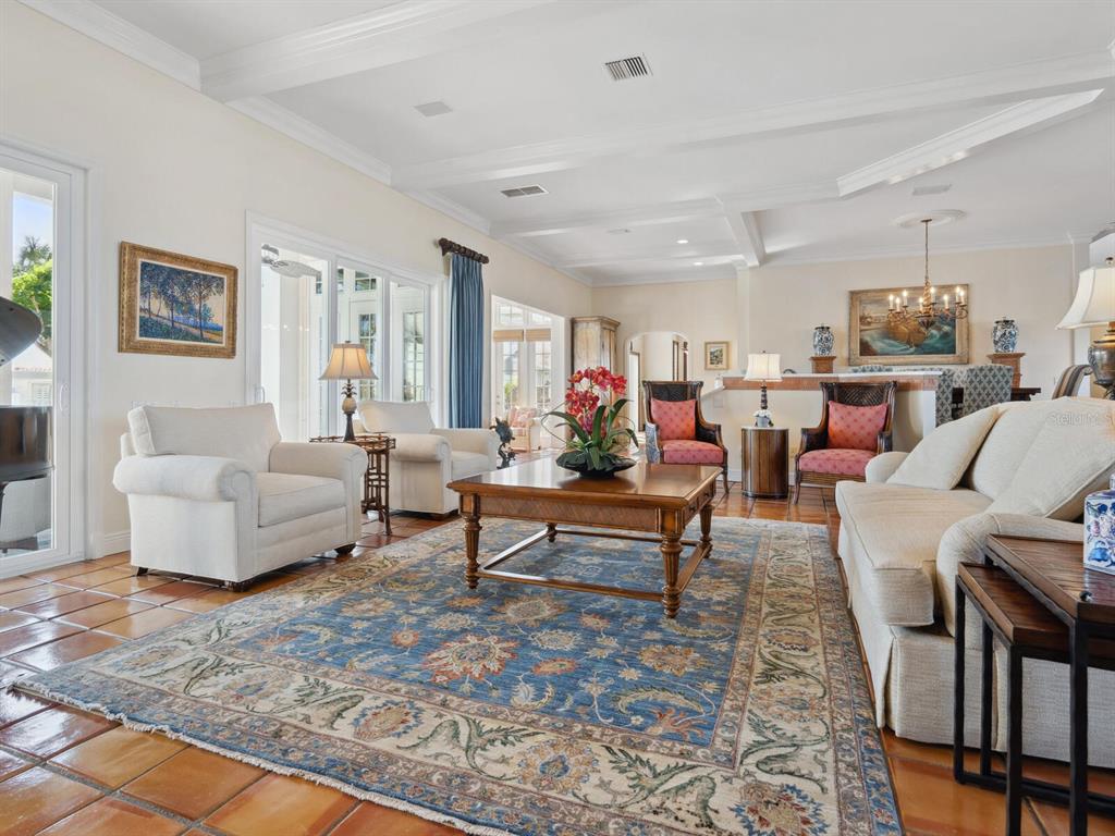 2110 Casey Key Road Nokomis, FL 34275 - Photo 11 of 75 a living room with furniture and a rug