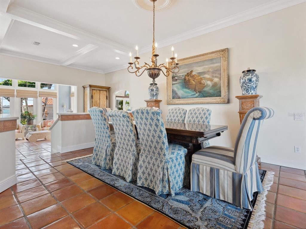 2110 Casey Key Road Nokomis, FL 34275 - Photo 12 of 75 a living room with furniture and a chandelier
