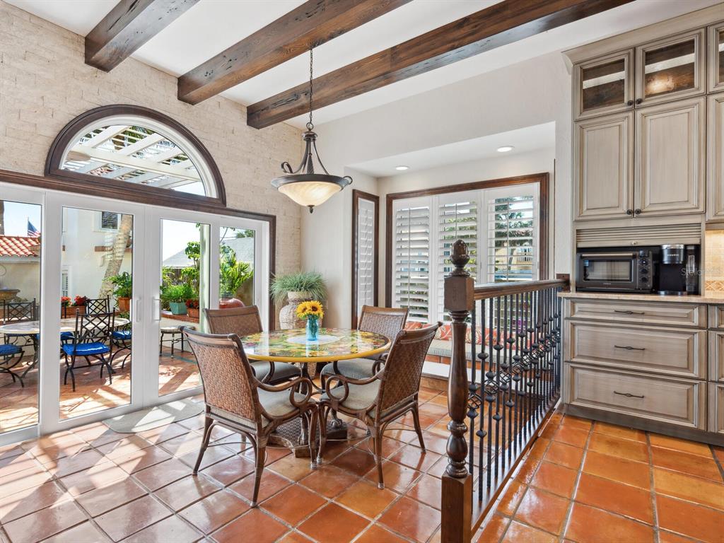 2110 Casey Key Road Nokomis, FL 34275 - Photo 20 of 75 a view of a dining room with furniture window and outside view