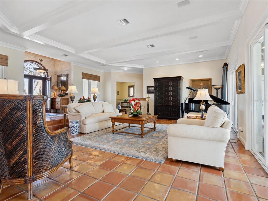 2110 Casey Key Road Nokomis, FL 34275 - Photo 41 of 75 a living room with furniture and a couch