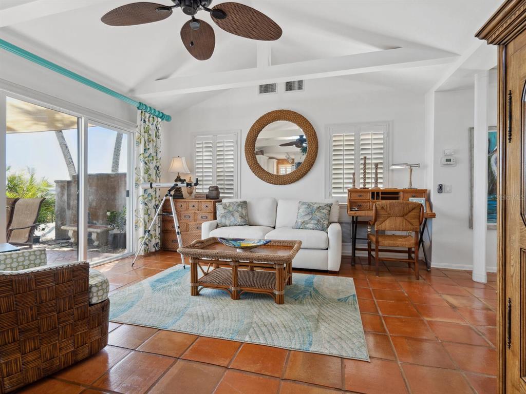 2110 Casey Key Road Nokomis, FL 34275 - Photo 45 of 75 a living room with furniture and a large window