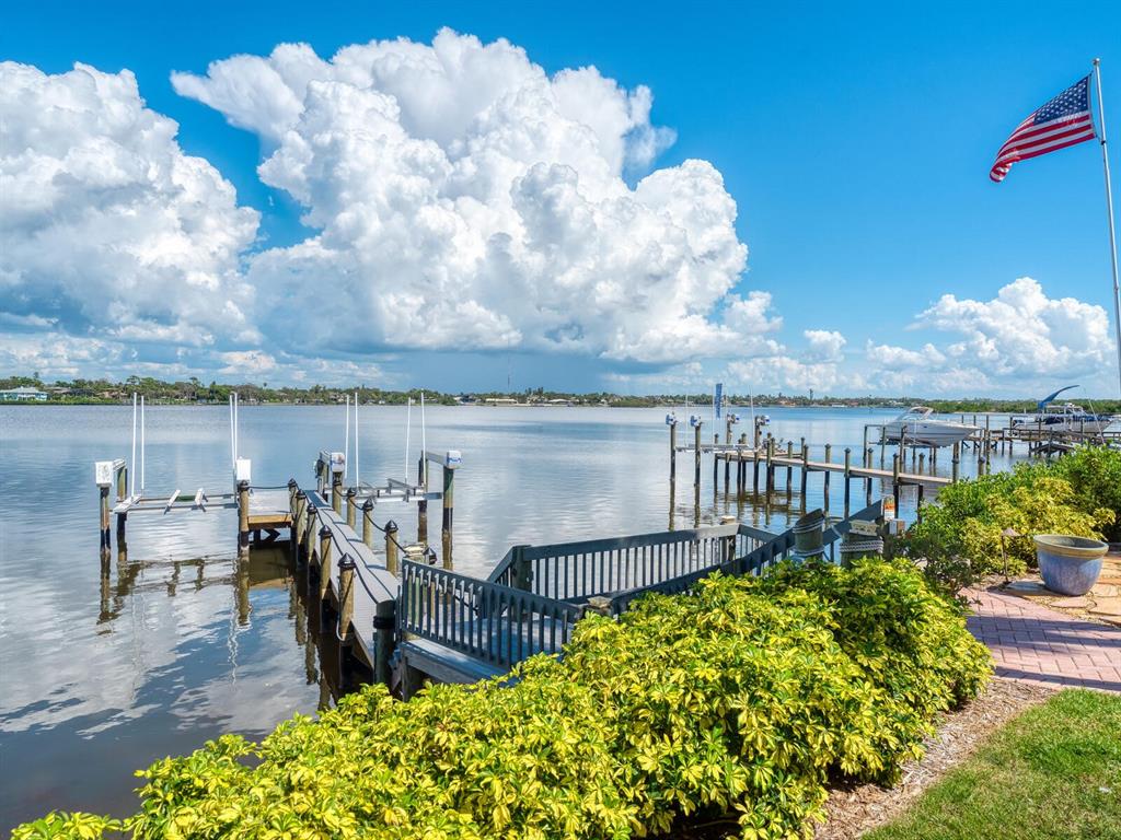 2110 Casey Key Road Nokomis, FL 34275 - Photo 51 of 75 a view of a garden with sitting area