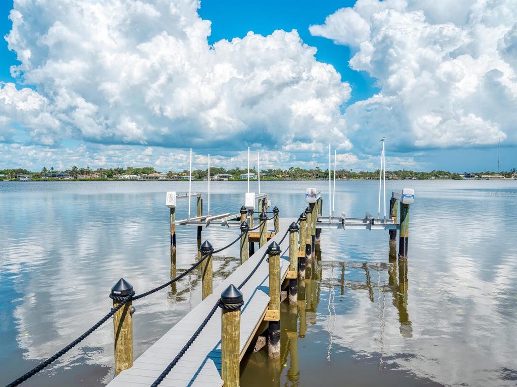 2110 Casey Key Road Nokomis, FL 34275 - Photo 52 of 75 a view of a lake with sitting area
