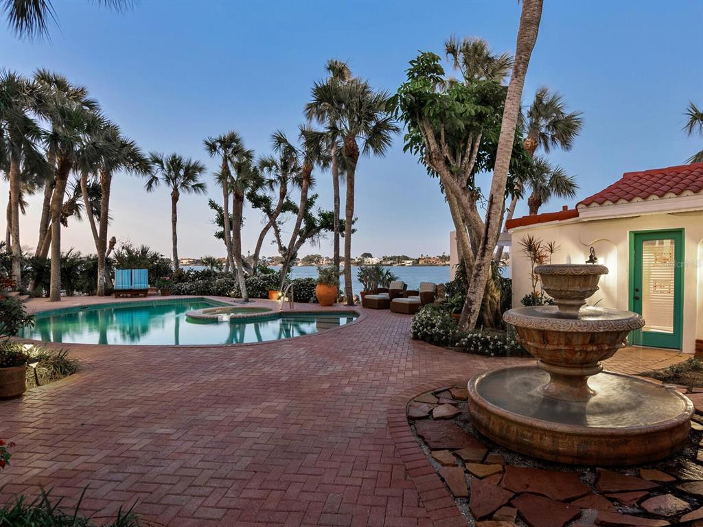 2110 Casey Key Road Nokomis, FL 34275 - Photo 62 of 75 a view of a house with backyard and sitting area