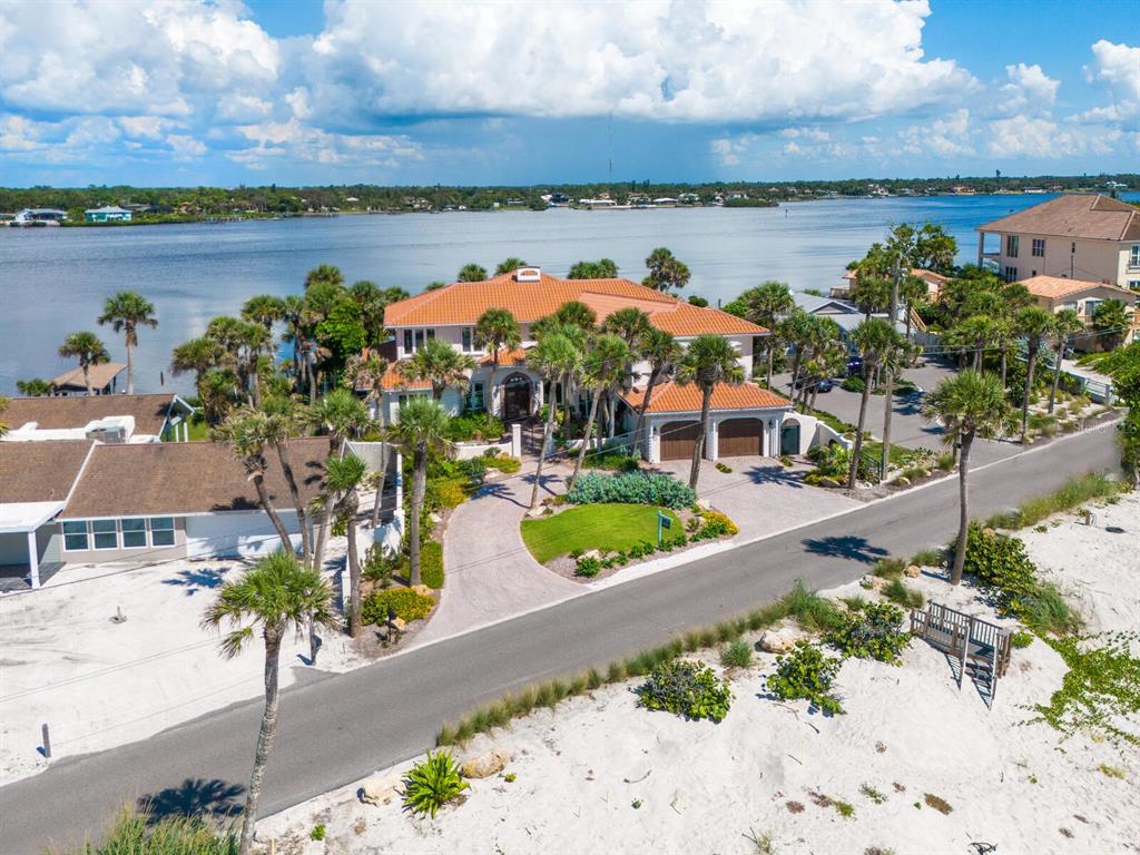 2110 Casey Key Road Nokomis, FL 34275 - Photo 72 of 75 a view of a lake with houses in the back