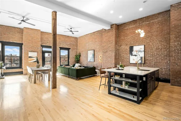 a room with furniture and a wooden floor