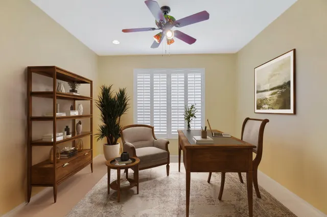 a workspace with furniture and a window