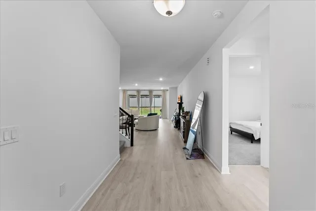 a view of livingroom with furniture and closet