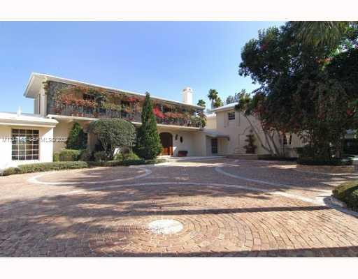 4511 Lake Road Miami, FL 33137 - Photo 1 of 14 a view of a house with a yard