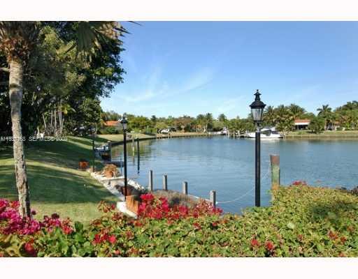 4511 Lake Road Miami, FL 33137 - Photo 3 of 14 a view of a lake with a house in the background