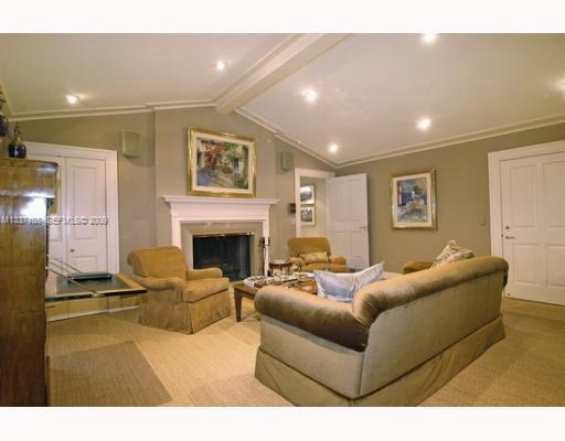 4511 Lake Road Miami, FL 33137 - Photo 4 of 14 a living room with furniture and a fireplace