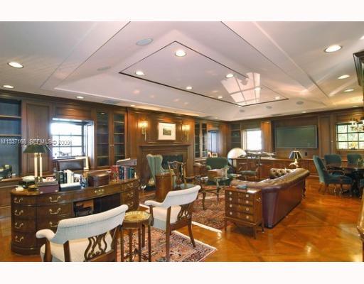 4511 Lake Road Miami, FL 33137 - Photo 8 of 14 a living room with lots of furniture and a large window