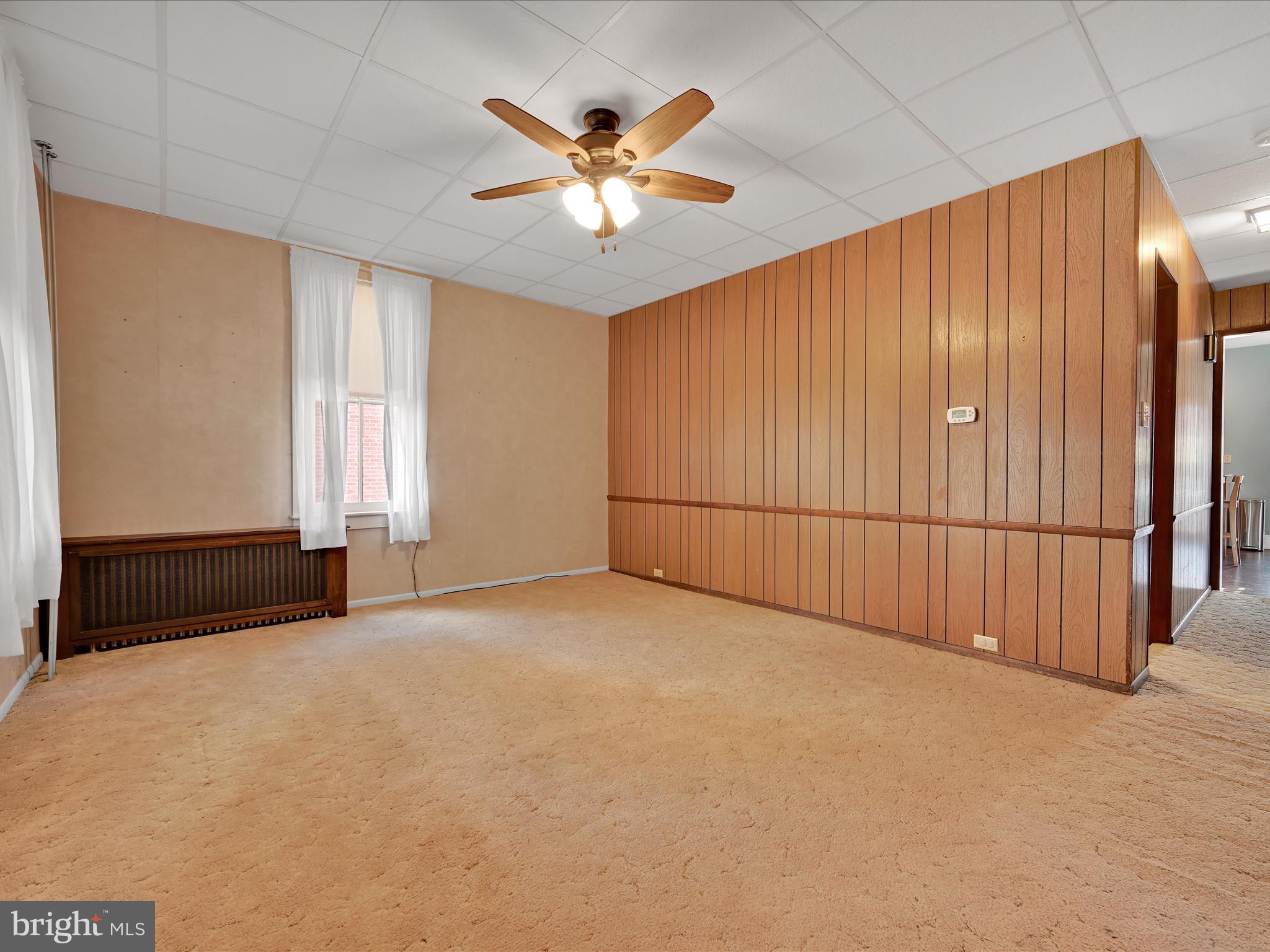 1425 Friedensburg Road Reading, PA 19606 - Photo 5 of 28 an empty room with ceiling fan and windows
