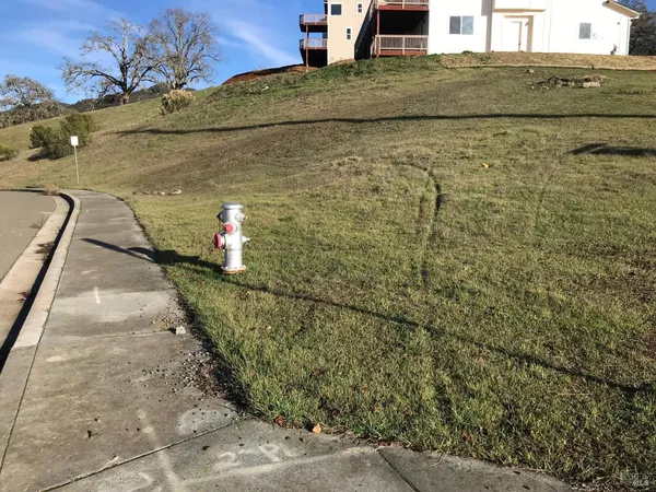 a view of a road with an ocean view