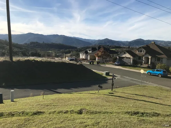 a view of a lake with a mountain in the background