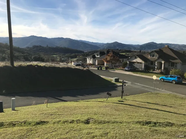 a view of a lake with a mountain in the background