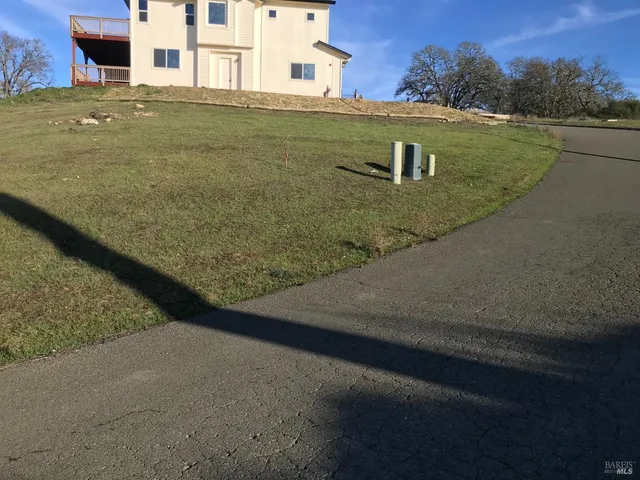 a view of a town with mountains in the background