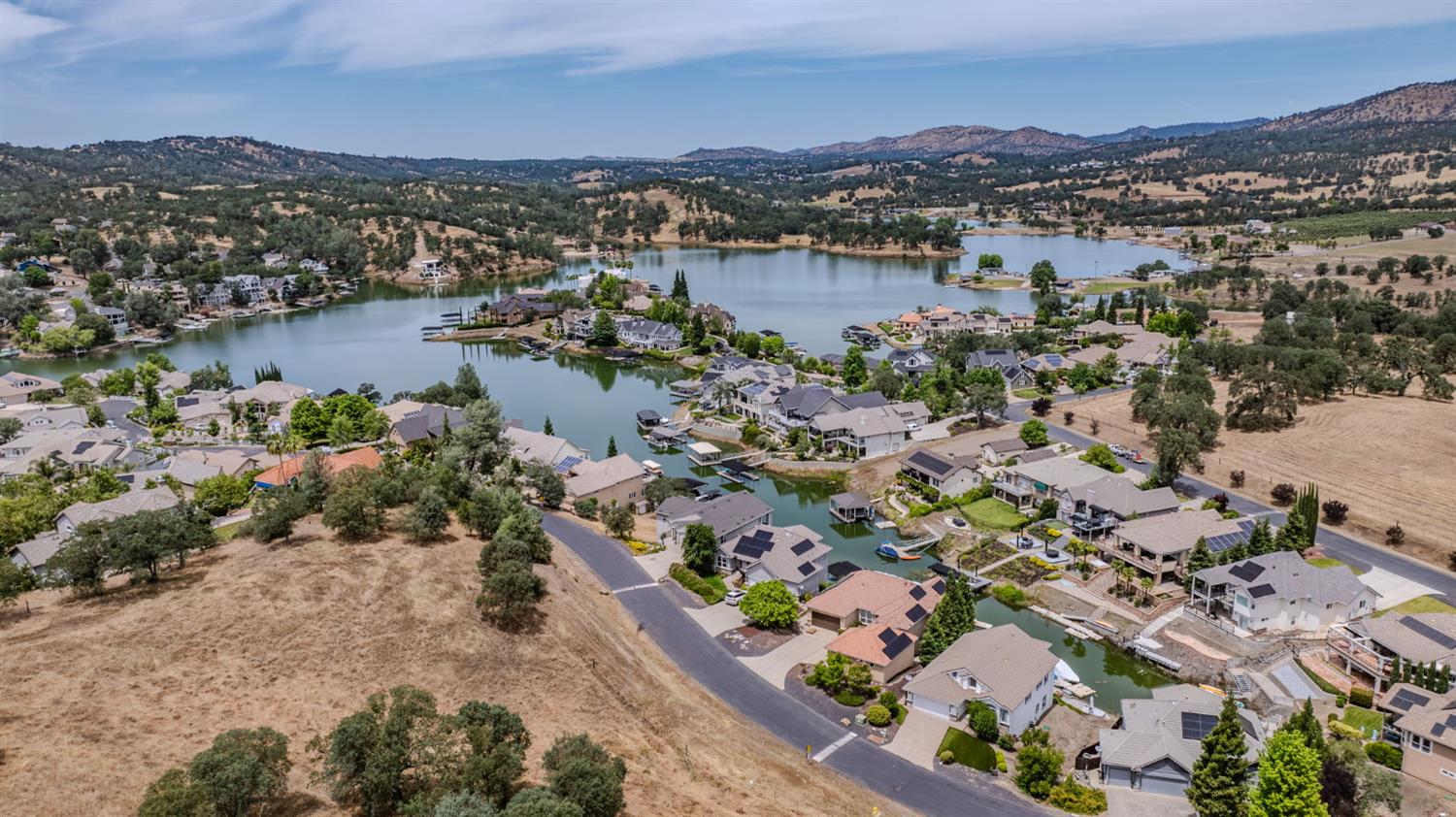 6066 Bluff View Road Copperopolis, CA 95228 - Photo 6 of 96 an aerial view of lake and residential houses with outdoor space
