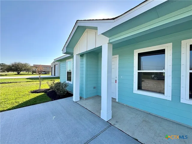 a view of a house with a swimming pool